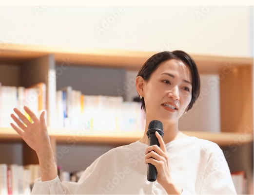 A guide speaking into a microphone during a training session